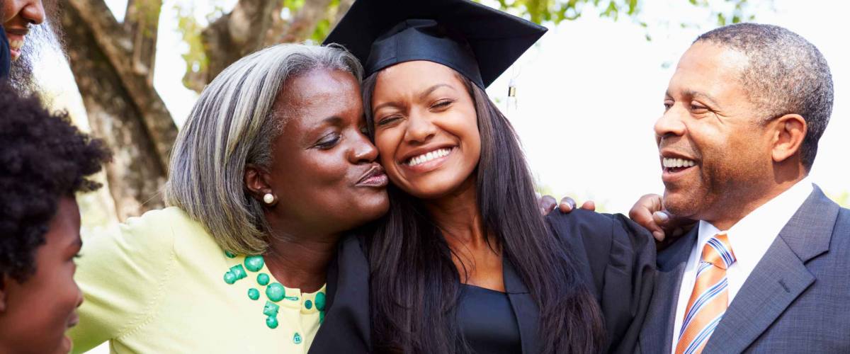 Student Celebrates Graduation With Parents