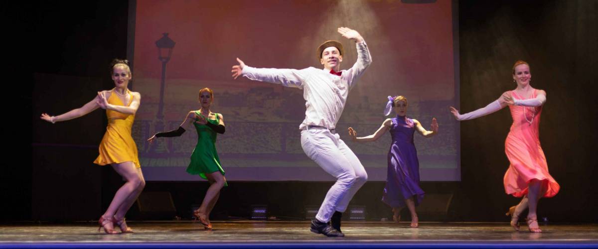 Dancer Actors perform on the theater stage in a dance show musical