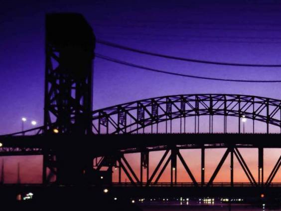 Hamilton Harbour Lift Bridge at twilight with lights reflecting off the water