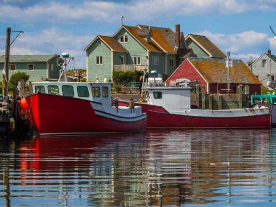 Summer view of fishermen houses and harbor at Peggy's Cove, Nova Scotia, Canada.