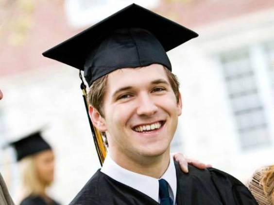 Graduation: Proud Male Student With Parents