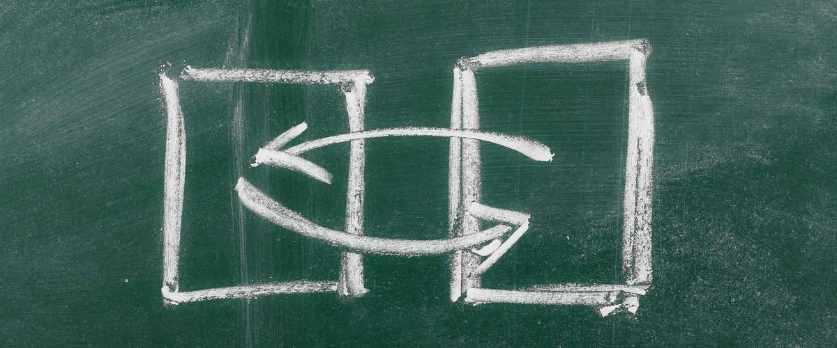 Exchange, swap concept on chalkboard, blackboard background, texture
