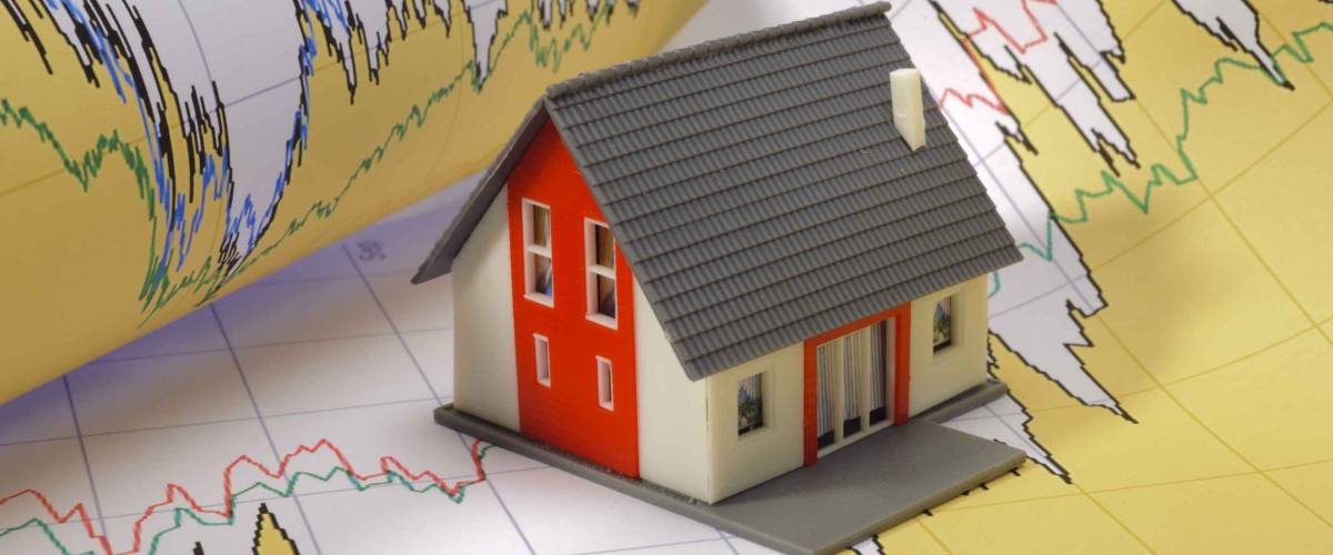model house on financial business chart