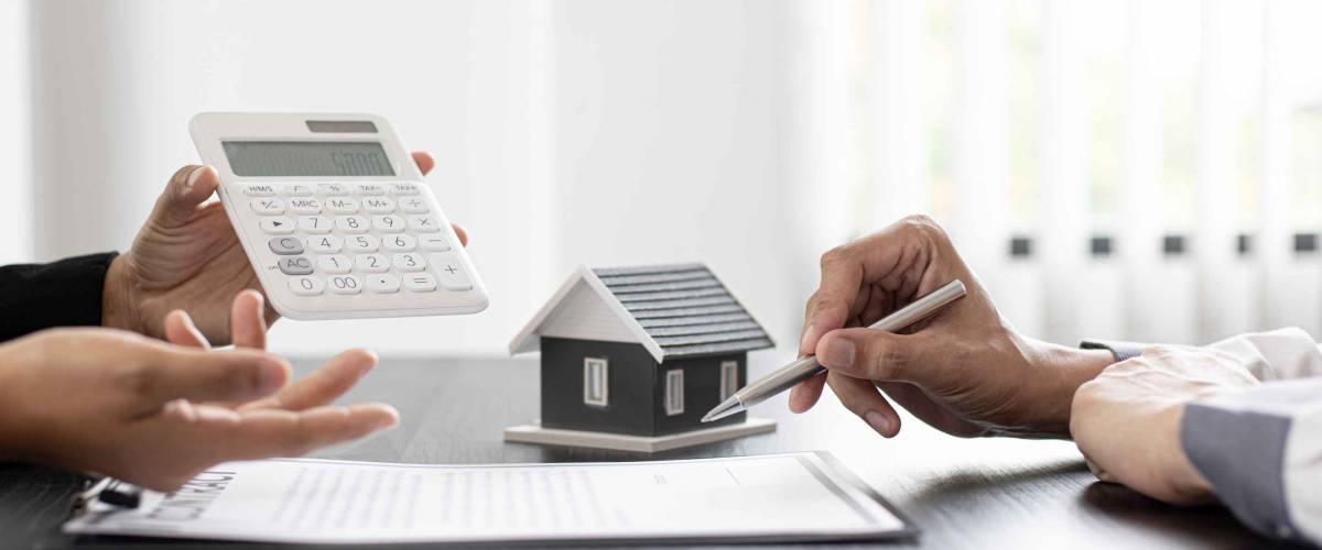 Real estate agent talked about the terms of the home purchase agreement and asked the customer to sign the documents to make the contract legally, Home sales and home insurance concept.