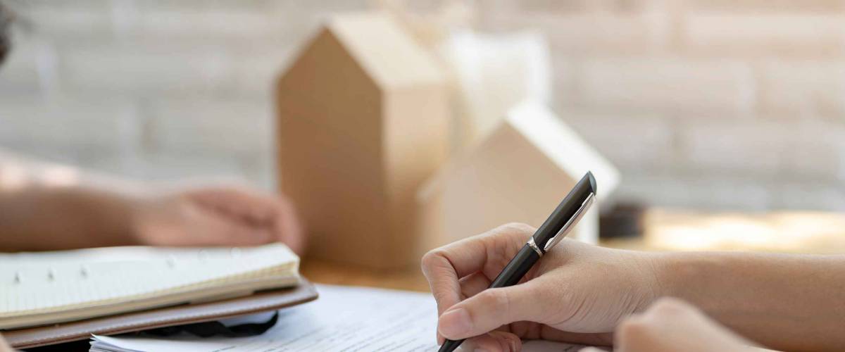 Woman putting signature on document loan contract, real estate purchase, success business contract deals with sale represent.