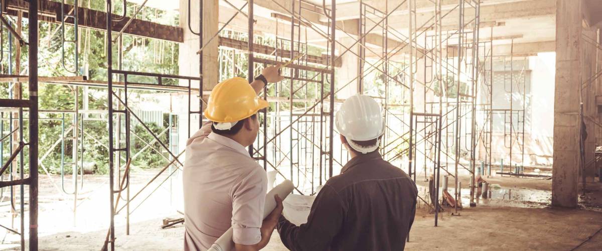 two business man construction site engineer, effect Vintage sun flare