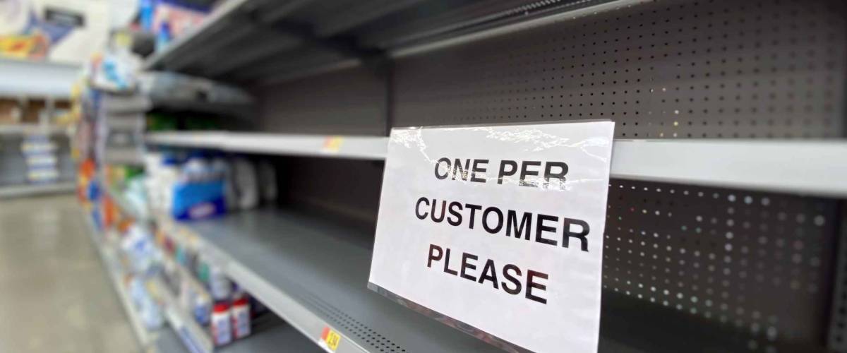 A view of empty shelves at a department store during the Coronavirus pandemic of 2020.