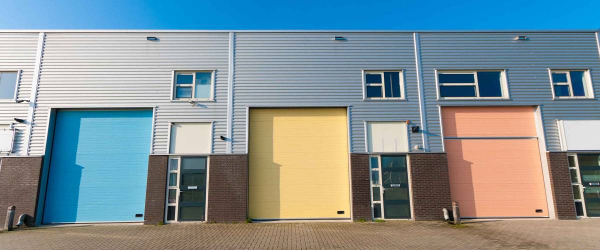 business units for small companies with colorful roller doors