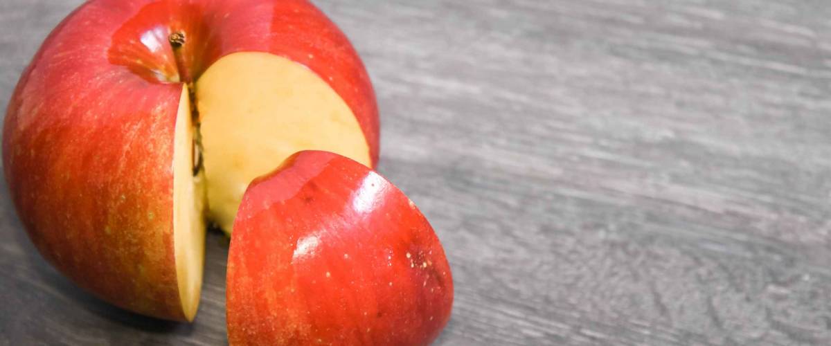 Business market share concept. 25 percent of an apple, part of the whole aplle, quater of the capital, interest rate.