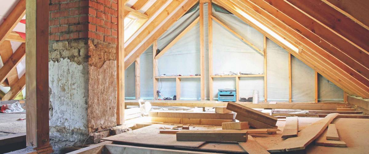 an interior view of a house attic under construction