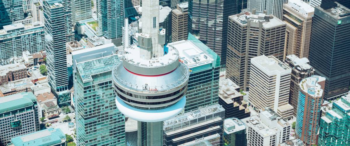 Top view of Toronto CN Tower and condo buildings