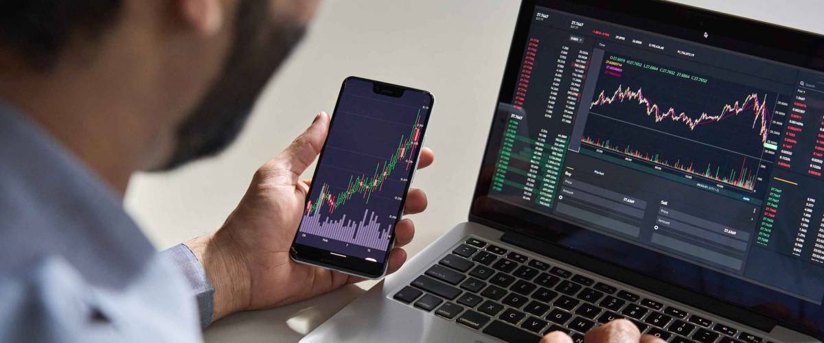 Business man trader investor analyst using mobile phone app analytics