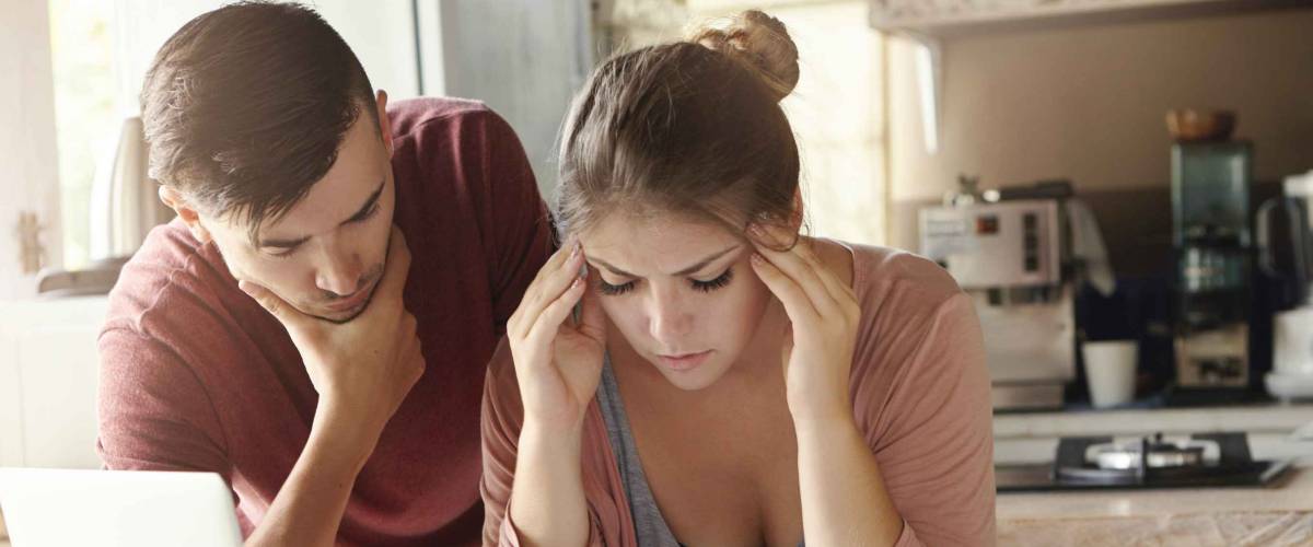 Young family with many debts facing financial stress.