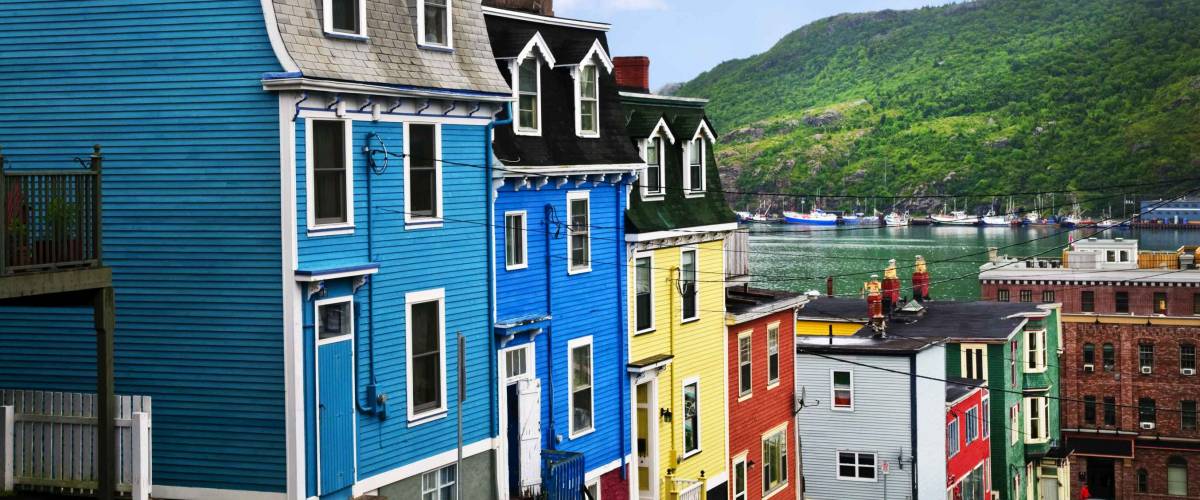 Street with colorful houses near ocean in St. John's, Newfoundland, Canada