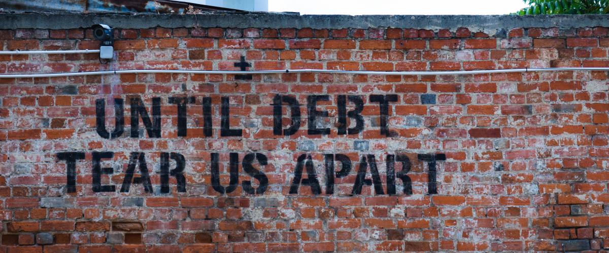 Debt graffiti in Lisbon, Portugal