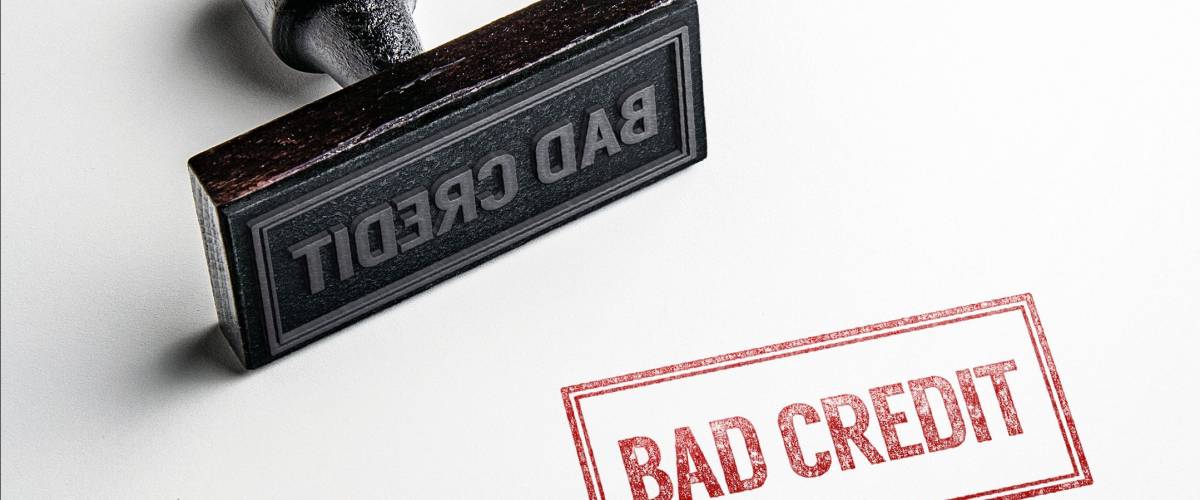 Rubber stamping that says 'Bad Credit'.
