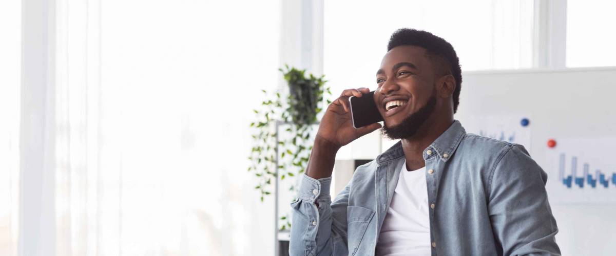 Happy man on phone