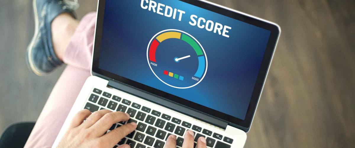 People using laptop and CREDIT SCORE concept on screen