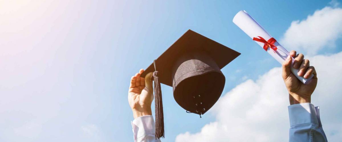 Graduation day, Images of graduates are celebrating graduation put hand up, a certificate and a hat in hand, Happiness feeling, Commencement day, Congratulation