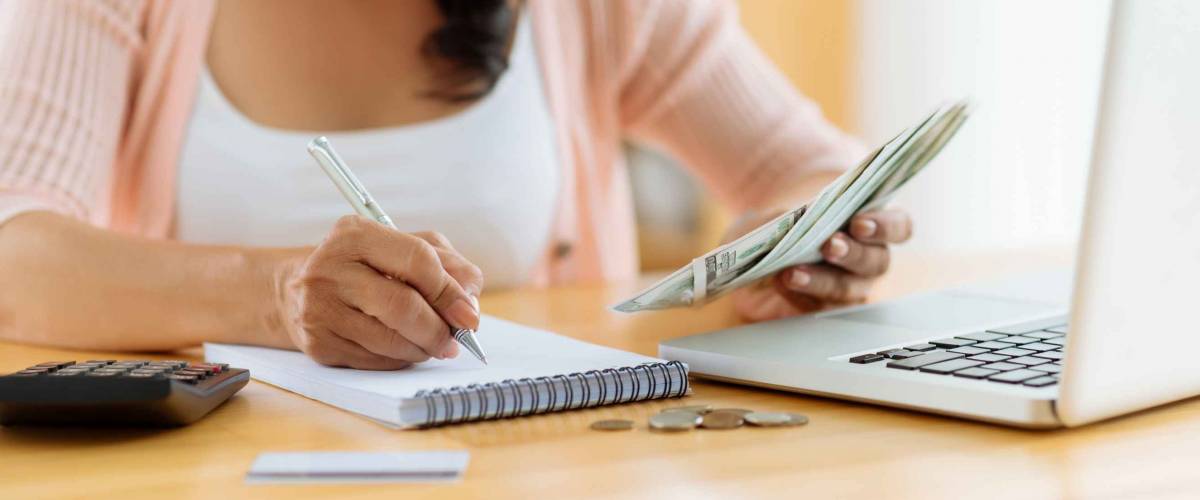 Woman distributing family budget