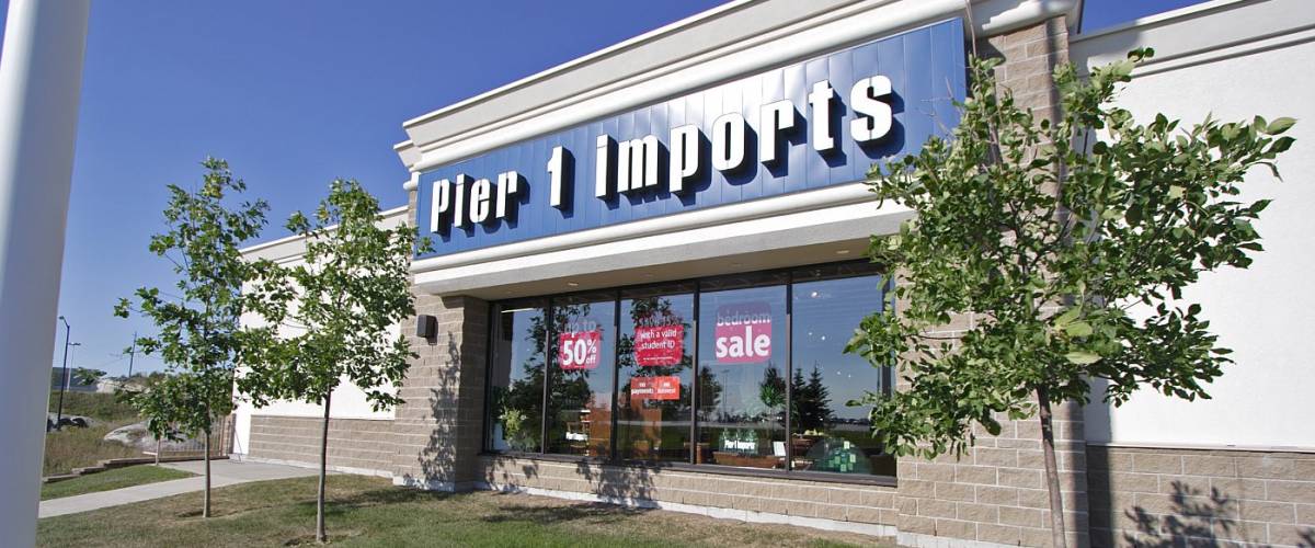 Pier 1 Imports store external view blue sign with white letter