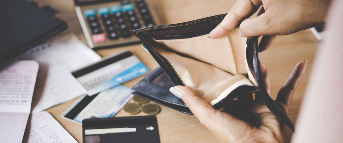 poor Asian woman hand open empty purse looking for money having problem  bankrupt broke after credit card payday