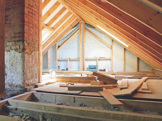 an interior view of a house attic under construction