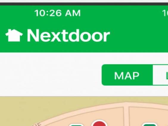 iPhone image with Nextdoor app open on it.