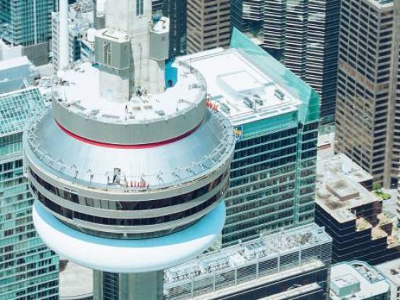 Top view of Toronto CN Tower and condo buildings