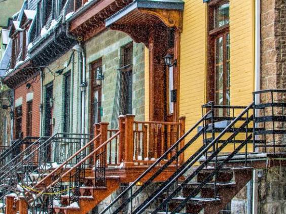 Row of houses on snowy street in Montreal