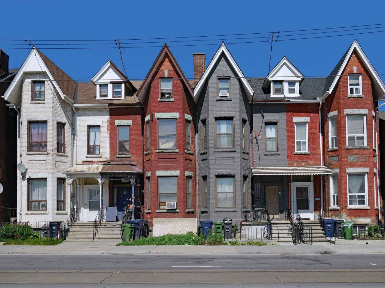 row of old Victorian urban houses with gables