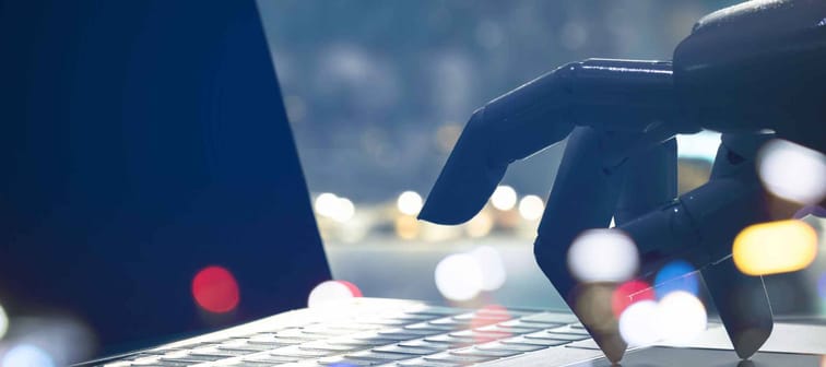 Robot finger point to laptop button