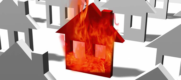 Burning house among non-burning houses