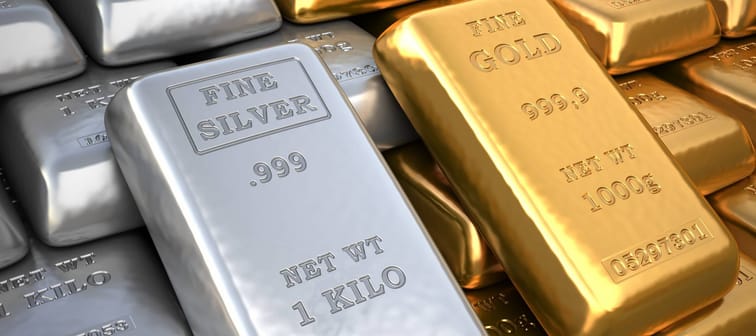 Silver ingot and gold bullion