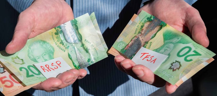 Man holding money labelled RRSP and TFSA